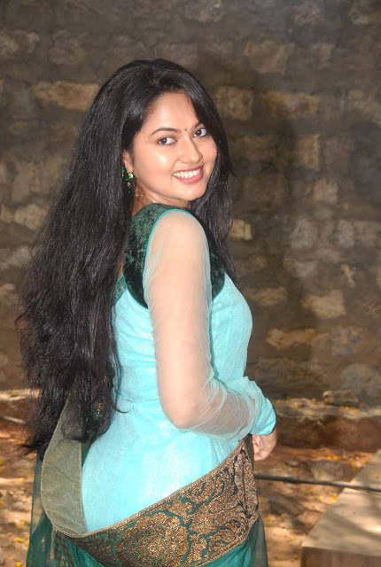 Telugu TV Actress Suhasini Long Hair Stills In Green Dress 8